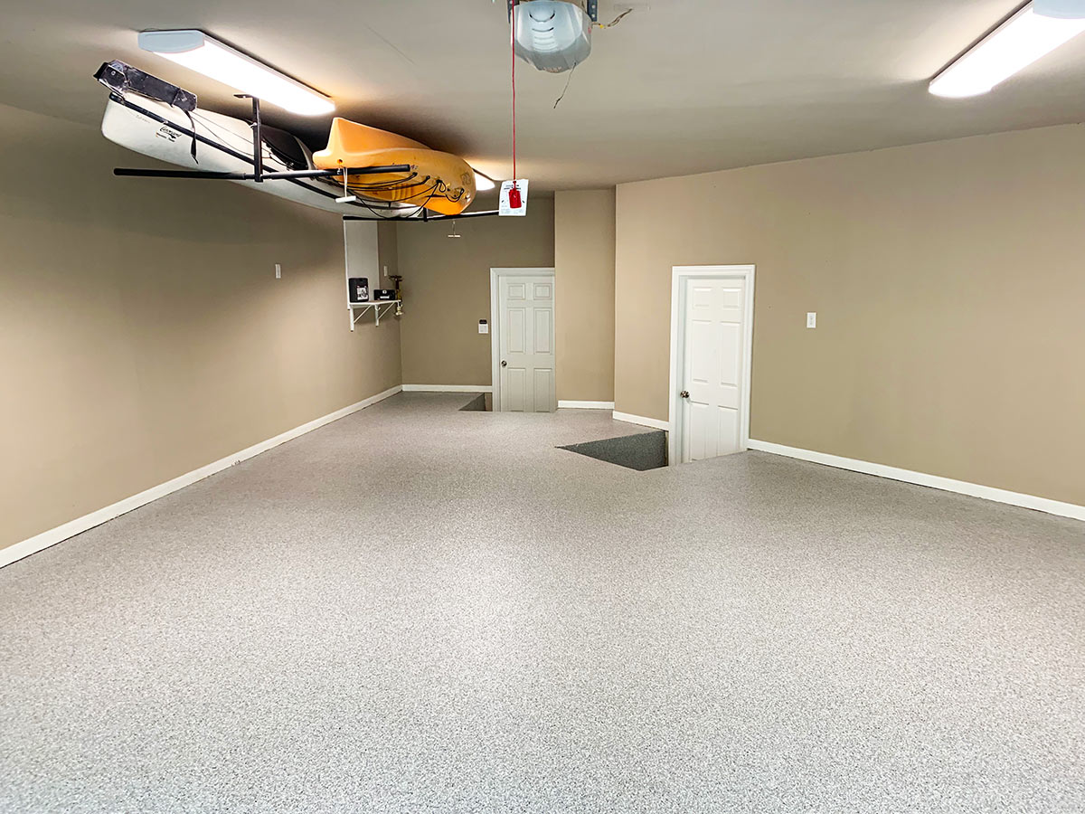 Epoxy Garage Floor Helps Hide A Concrete Pour Back Majestic Concrete