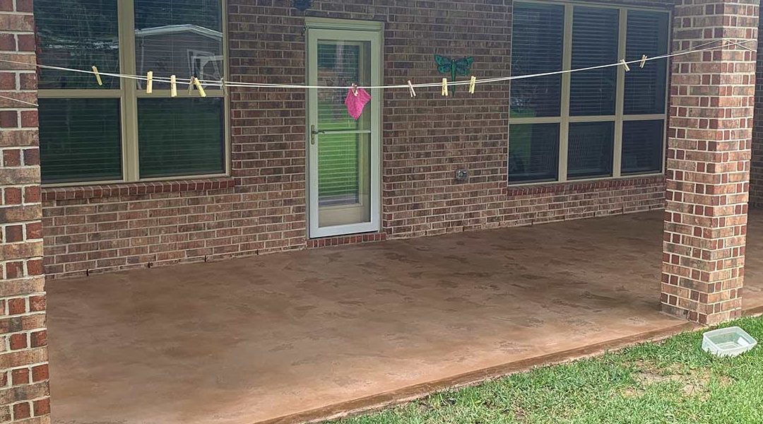 Concrete Overlay To Correct A Rain Damaged Patio